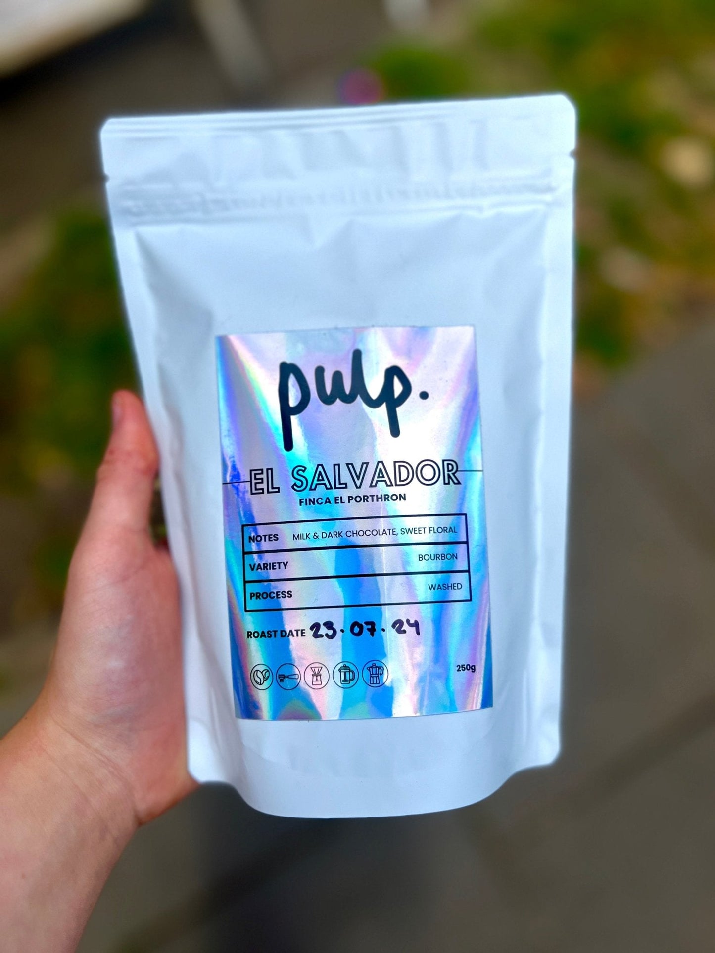 El Salvador Coffee | Finca El Porthron Bourbon by Pulp in a sleek, modern packaging showcasing its washed process coffee variety, featuring flavour notes of milk and dark chocolate.