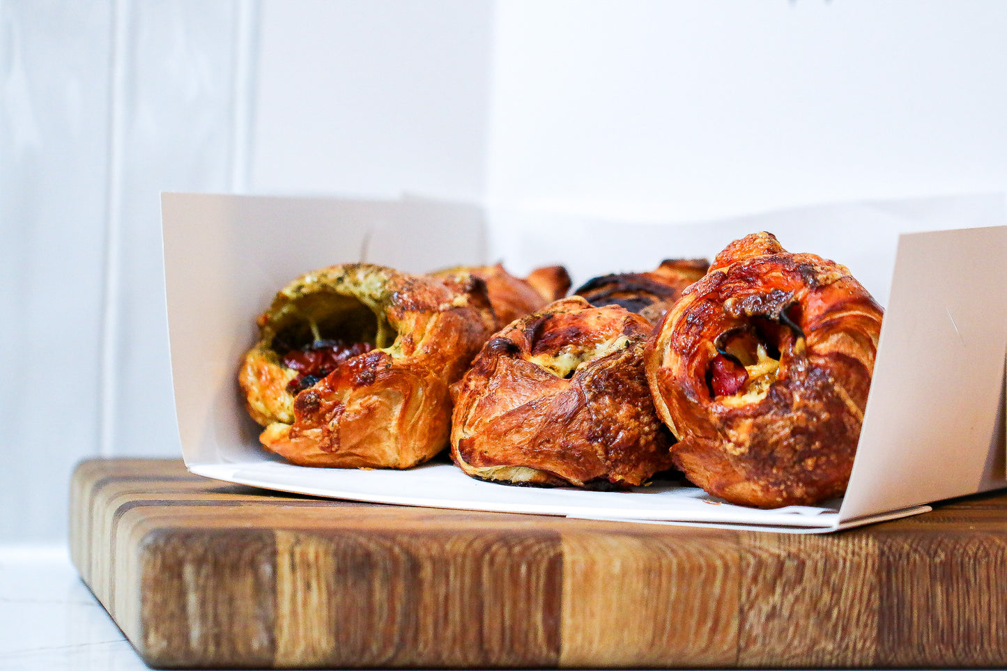 9 savoury pastries with chorizzo , sundried tomato and basil, marmite and cheddar flavour 